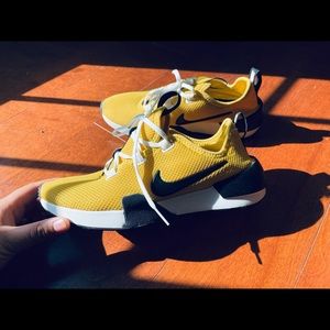 Nike yellow running shoes